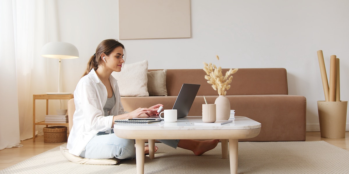 content marketing - woman on a floor on the computer