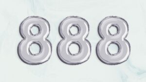 Angel Numbers 888 on a light teal background